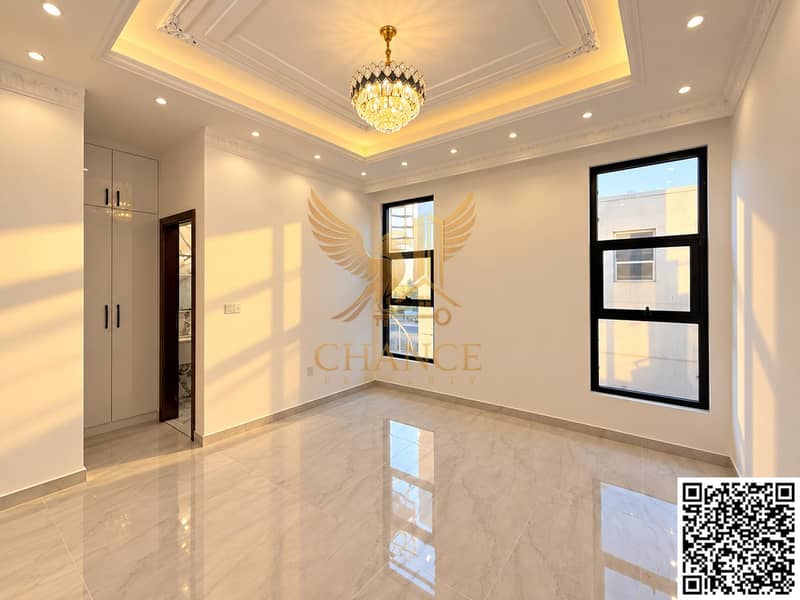 8 Luxurious Sunlit Room with Crystal Chandelier. png