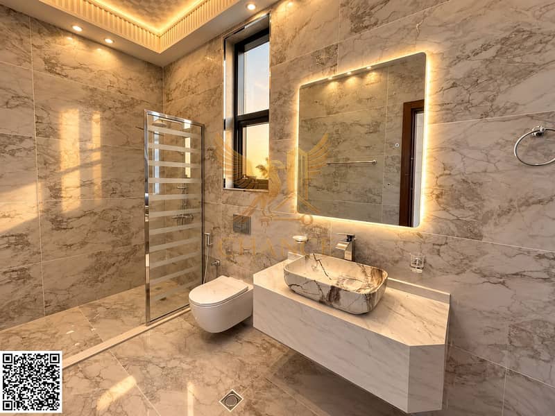 11 Sunset Glow in a Marble Bathroom. png