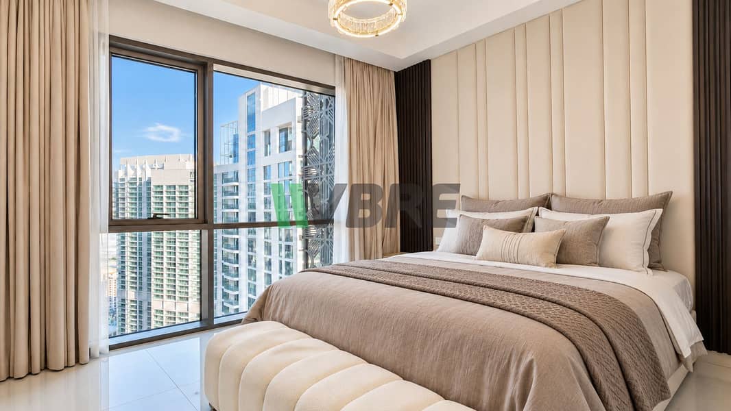 6 Luxury Taupe Bedding with City View. png