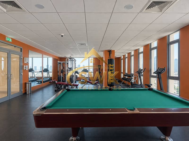8 Modern Gym Lounge with Pool Table. png