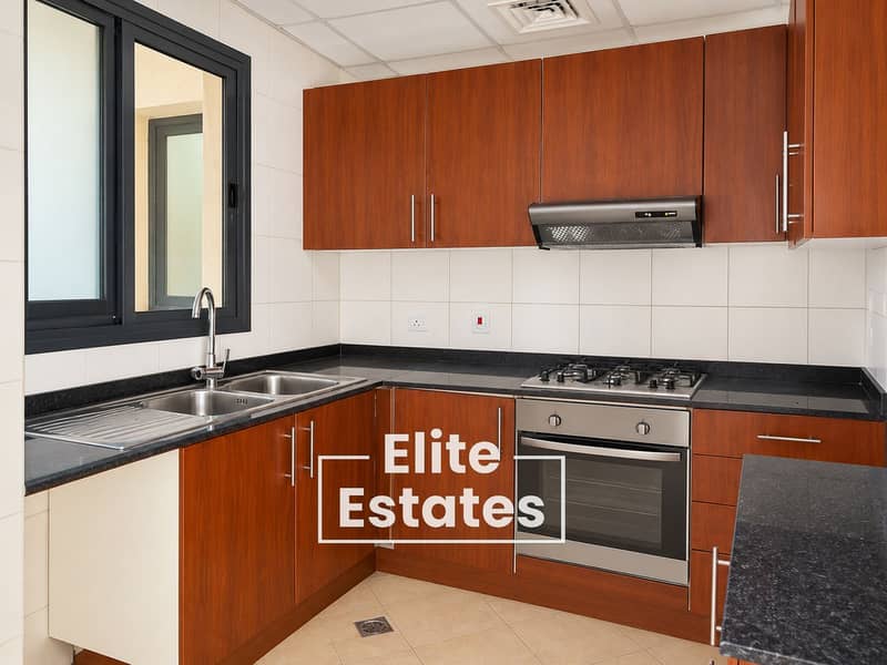 6 Bright Modern Wood-and-Granite Kitchen. png