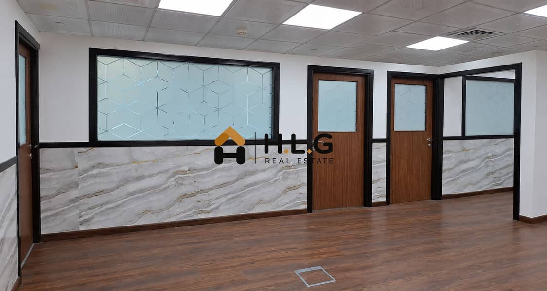2 Modern Office Corridor with Geometric Glass. png