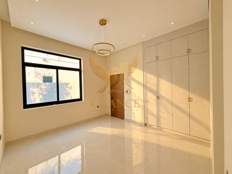 7 Sunlit Minimalist Room with Warm Wood Details-3. png