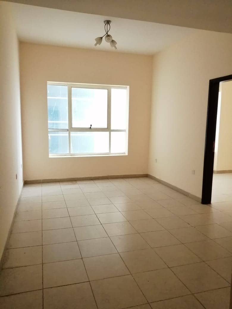 Best Offer!! 1 Bedroom Hall w/ closed kitchen and open road view in Mandarin Tower Ajman