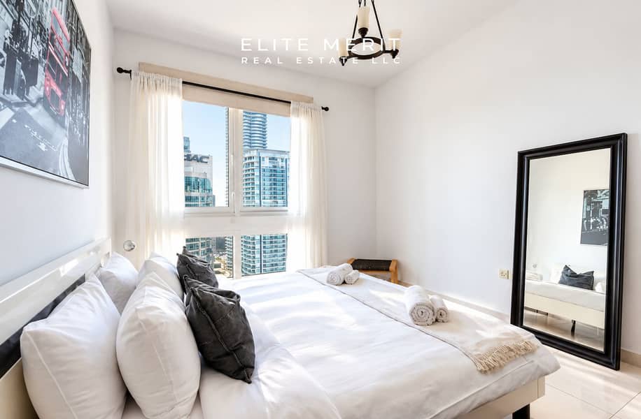 8 Sunlit Modern Bedroom with City Views. png