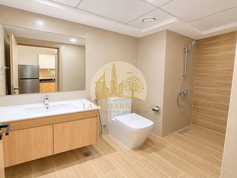 9 Modern Minimalist Beige and Wood Bathroom. png