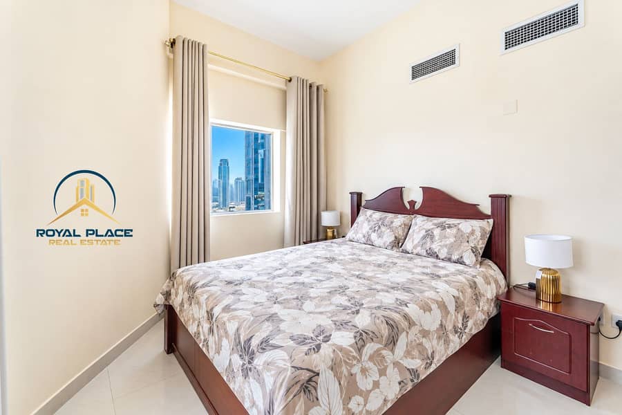 4 Bright Modern Bedroom with City View. png