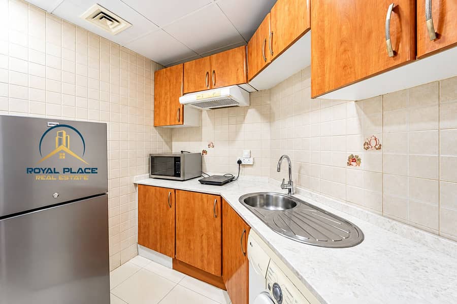 7 Cozy Modern Kitchen with Wood Cabinets. png