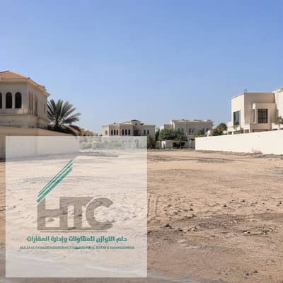 Plot for Sale in Shakhbout City, Abu Dhabi - Generate a ground-level realistic photo of a premi. png