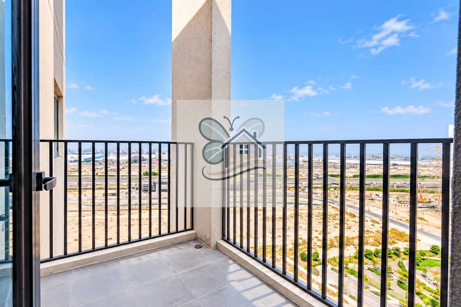 12 sunny_balcony_overlooking_industrial_horizon. jpg