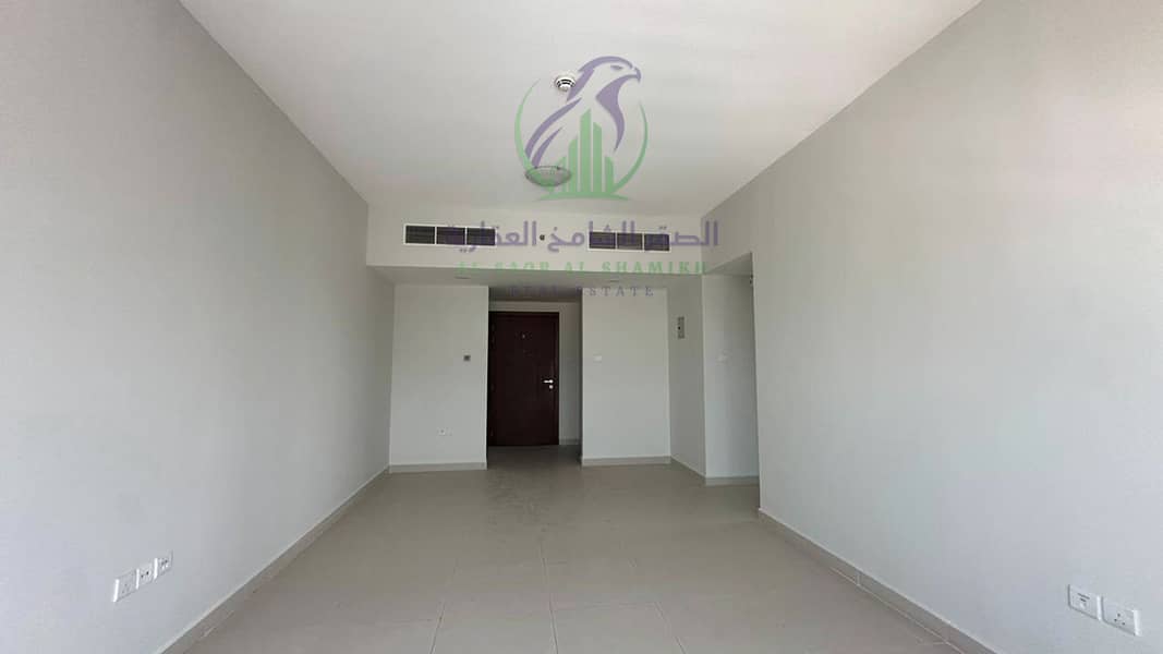 3 apartment-for-rent-2-bedroom-altaawn-alsharqh-living-room-01. jpg