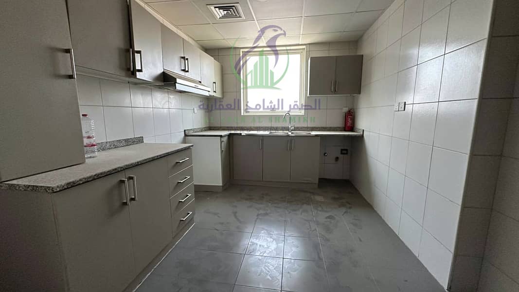 8 apartment-for-rent-2-bedroom-altaawn-alsharqh-kitchen-06. jpg