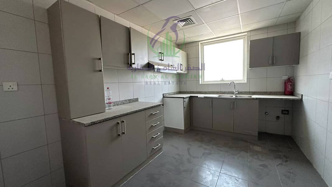 9 apartment-for-rent-2-bedroom-altaawn-alsharqh-kitchen-12. jpg