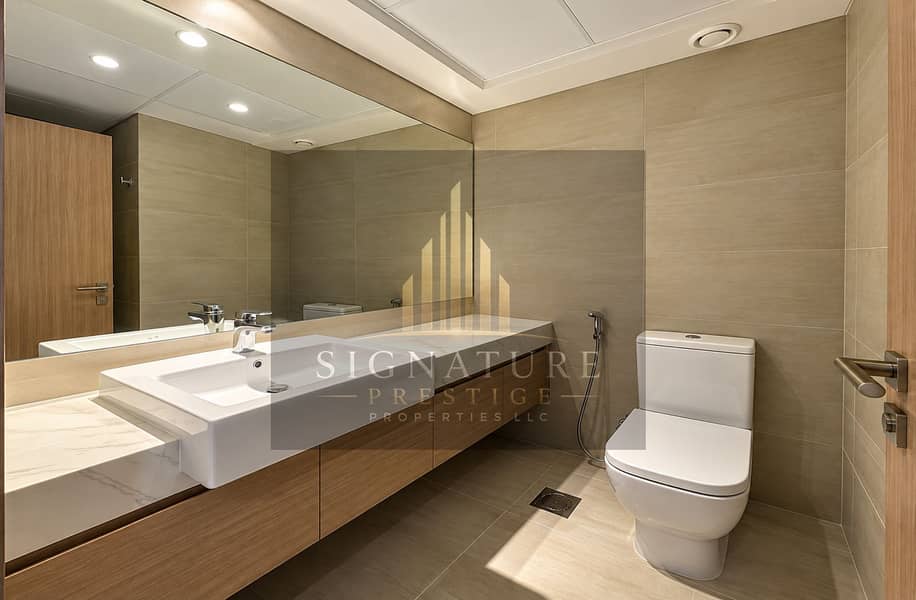 9 Modern Taupe Bathroom with Floating Vanity. png