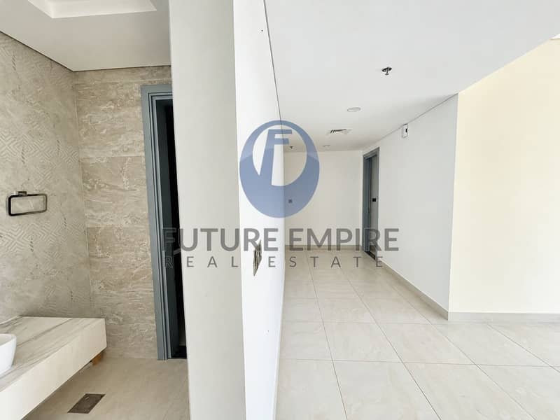 6 Bright Minimalist Marble-Tiled Hallway. png