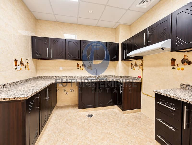 10 Modern Espresso U-Shaped Kitchen. png