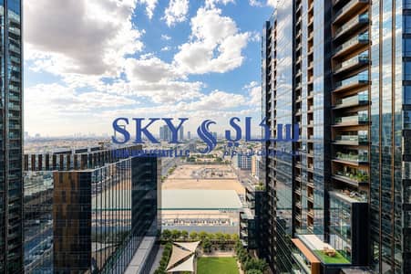2 Camere Appartamento in affitto a Bur Dubai, Dubai - Glass Towers Framing a Sunlit City Vista. png