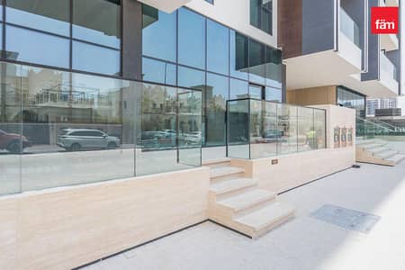 Shop for Rent in Jumeirah Village Circle (JVC), Dubai - Retail Shop Main Road Brand New Shell & Core