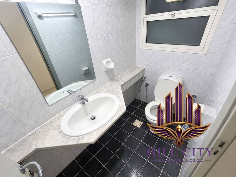 5 Modern Marble-Tiled Bathroom Interior. png