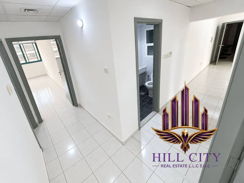6 Bright Minimalist Apartment Corridor. png