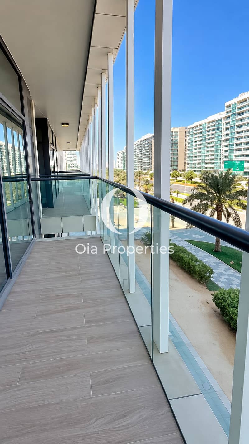 4 Modern Balcony Corridor Overlooking Palm-Lined City. png