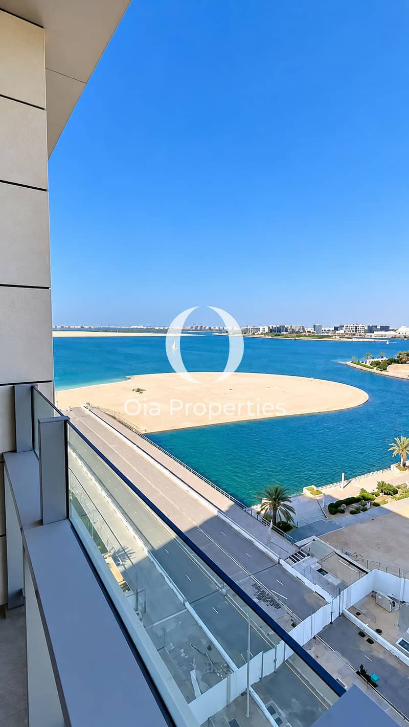 2 Modern Balcony Overlooking Turquoise Lagoon. png