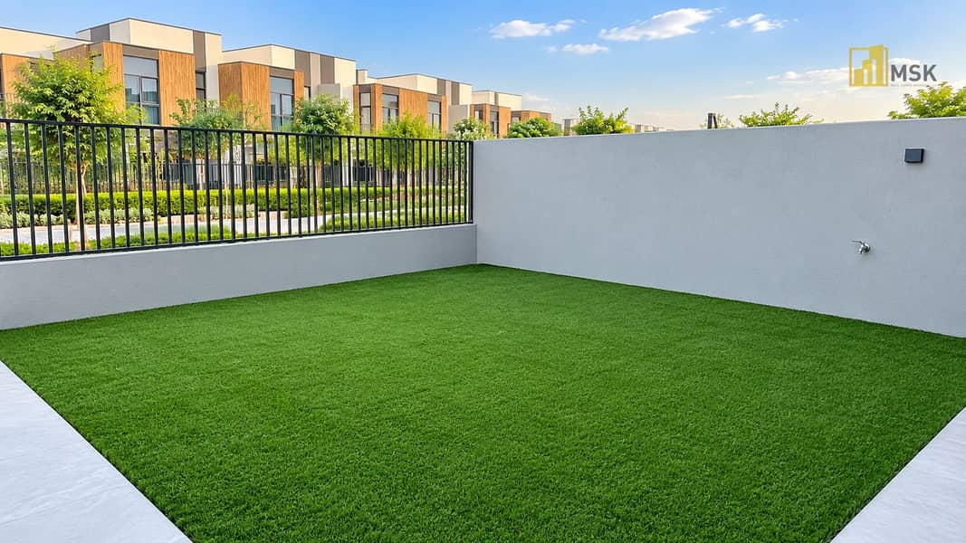 Modern Townhouse Terrace with Lush Turf. png Modern Townhouse Terrace with Lush Turf. png