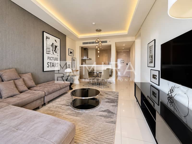 Modern Taupe Living Room with Pendant Lights Modern Taupe Living Room with Pendant Lights