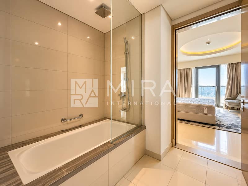 6 Modern Bathroom Opening to City-View Bedroom