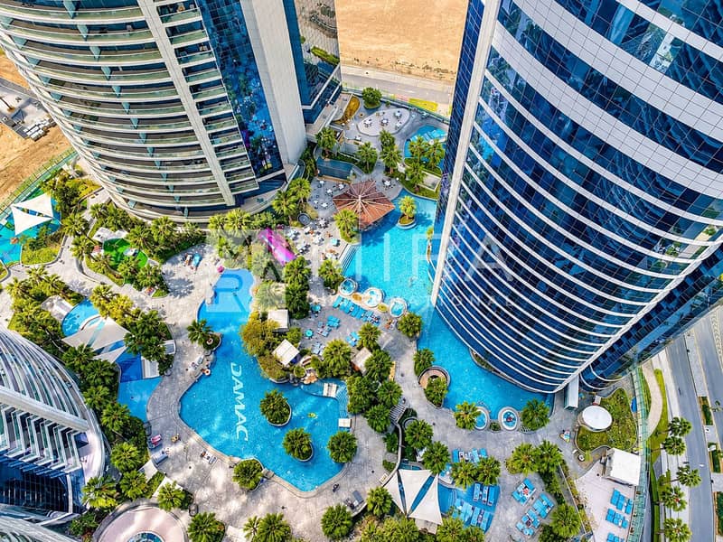 8 Aerial Luxury Pool Complex with DAMAC Lagoon