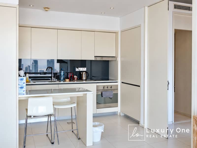 3 Modern Minimalist Kitchen with Breakfast Bar. png