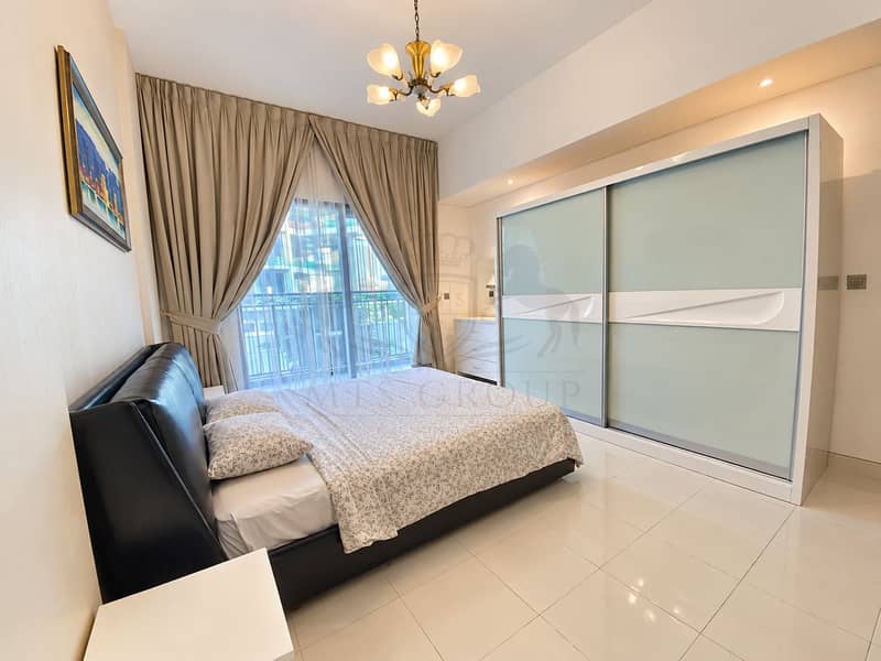 4 Bright Modern Bedroom with City View. png