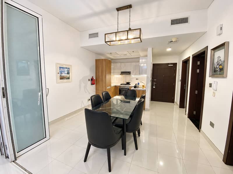6 Modern Dining Area with Open Kitchen. png