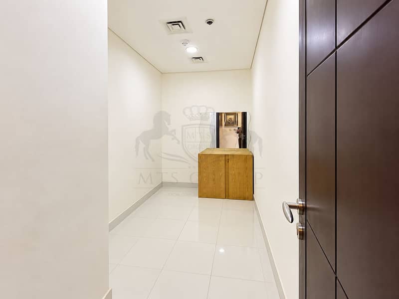 7 Minimalist Hallway with Wavy Mirror. png