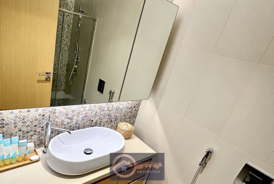 6 Restored bathroom with mirror and tiles. png