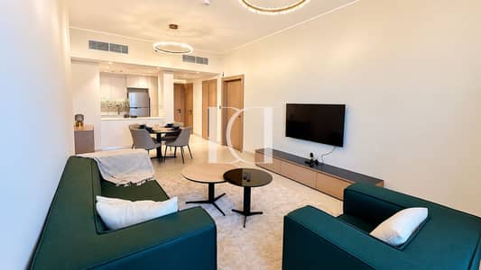 1 Bedroom Apartment for Rent in Jumeirah Village Circle (JVC), Dubai - Modern Green Sofa Apartment Interior. png