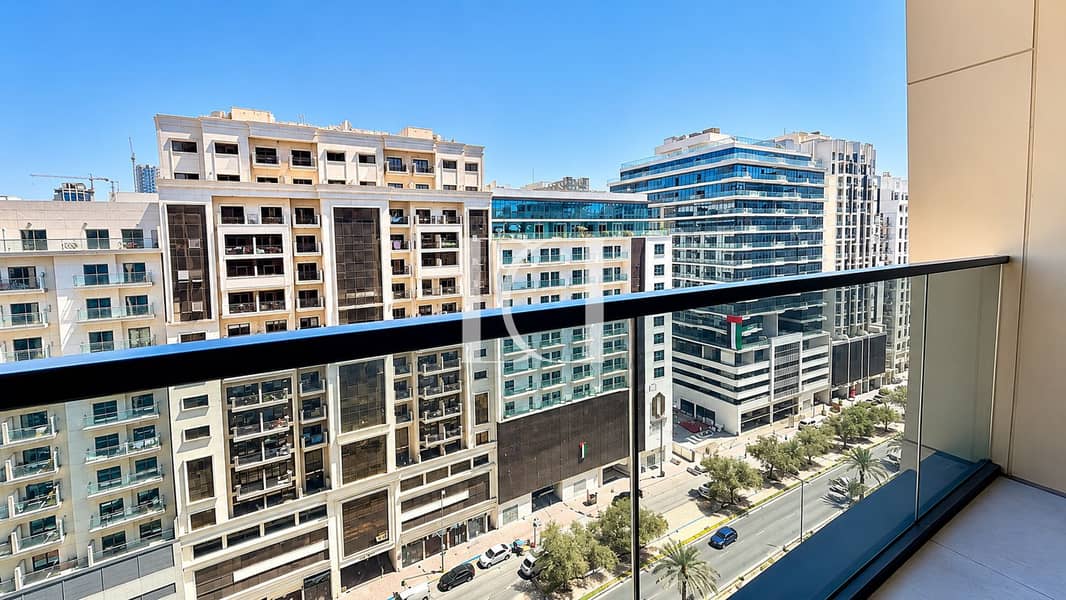 13 Sunlit Modern Cityscape from Balcony. png