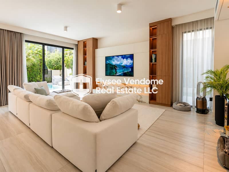 3 Salon moderne lumineux avec vue sur piscine. png