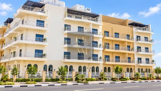 朱美拉环形村(JVC)， 迪拜 单身公寓待租 - Sunny Modern Apartment Building with Landscaped Street. png