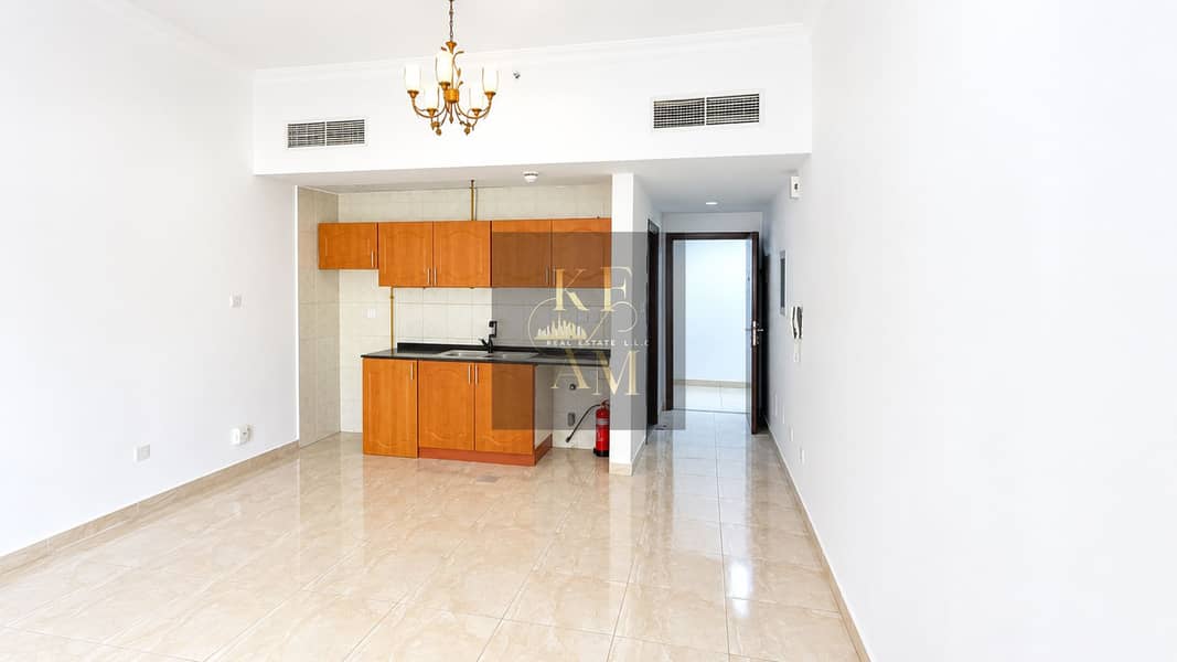 12 Bright Minimalist Apartment with Compact Kitchenette. png