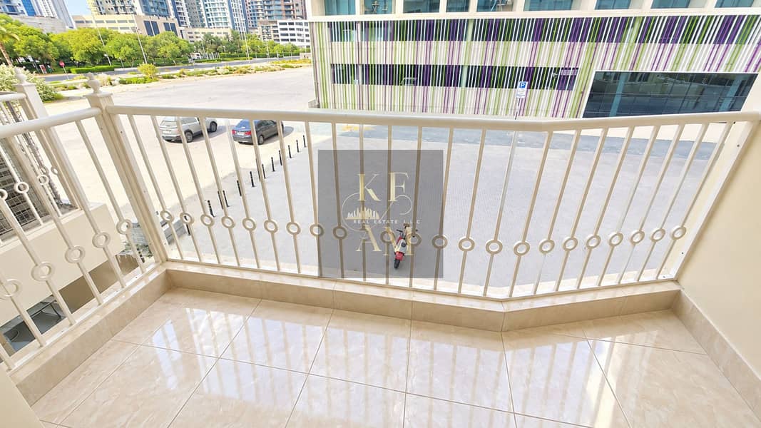 18 Modern Balcony Overlooking Urban Courtyard. png