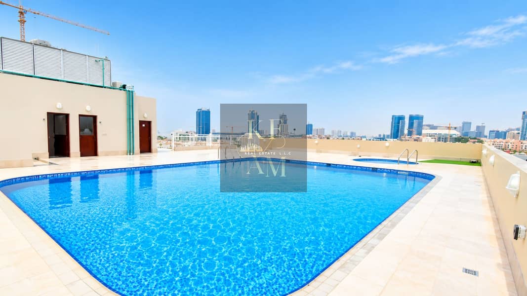 23 Vibrant Rooftop Pool Overlooking the City. png
