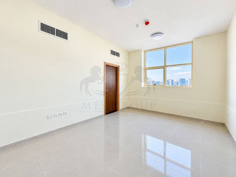 8 Bright Minimalist Room with City View. png
