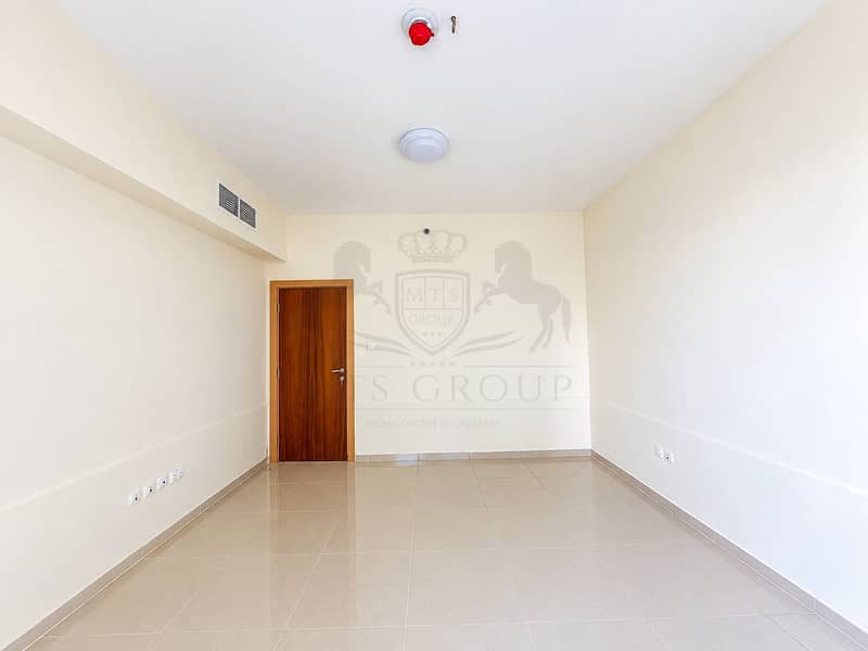 10 Minimalist Cream Room with Wooden Door. png