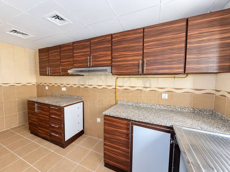 12 Modern Woodgrain Kitchen Interior. png