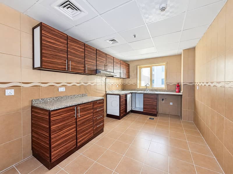 16 Modern Wood-Grain Kitchen Interior. png
