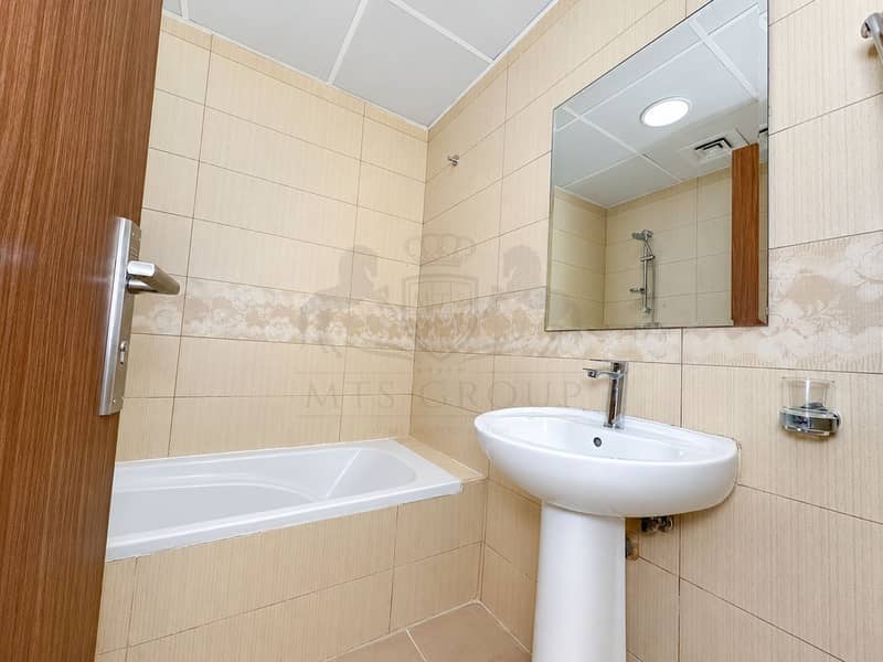 19 Modern Beige Tile Bathroom. png