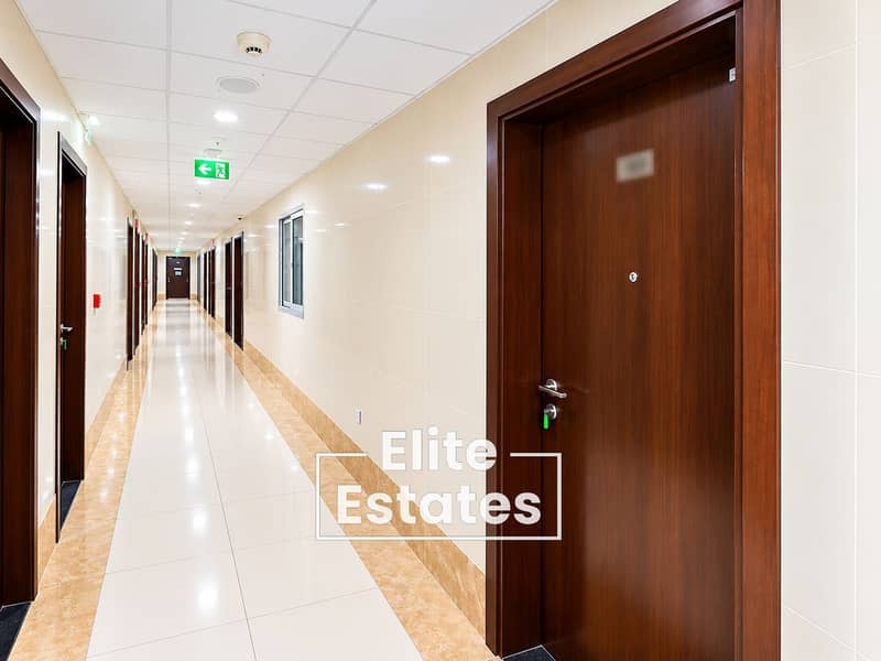 8 Modern Corridor with Blurred Room Number. png