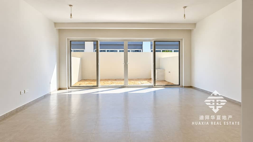 Sunlit Minimalist Room with Patio Views. png Sunlit Minimalist Room with Patio Views. png