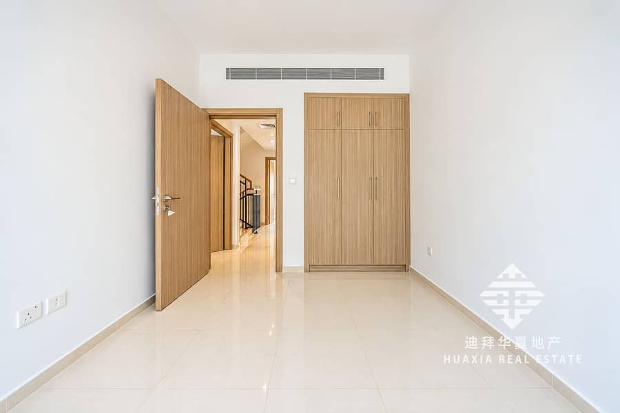 9 Bright Minimalist Room with Open Hallway. png